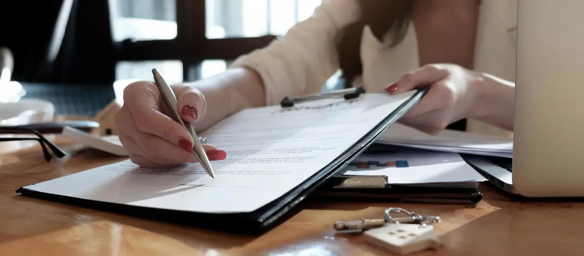 A real estate agent reviewing property valuation documents in an Australian suburb