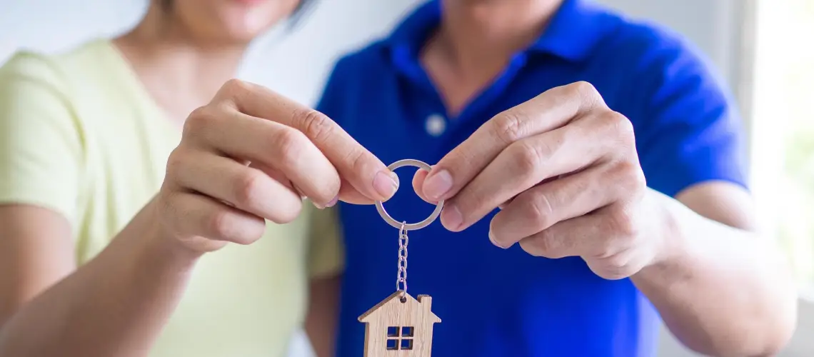 A young couple excited about buying their first home in Brisbane
